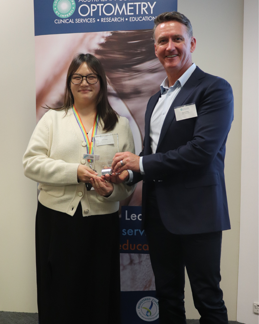 Nancy Huang receives ACO Outstanding Graduate Award from Darrell Baker (Deputy Chair)