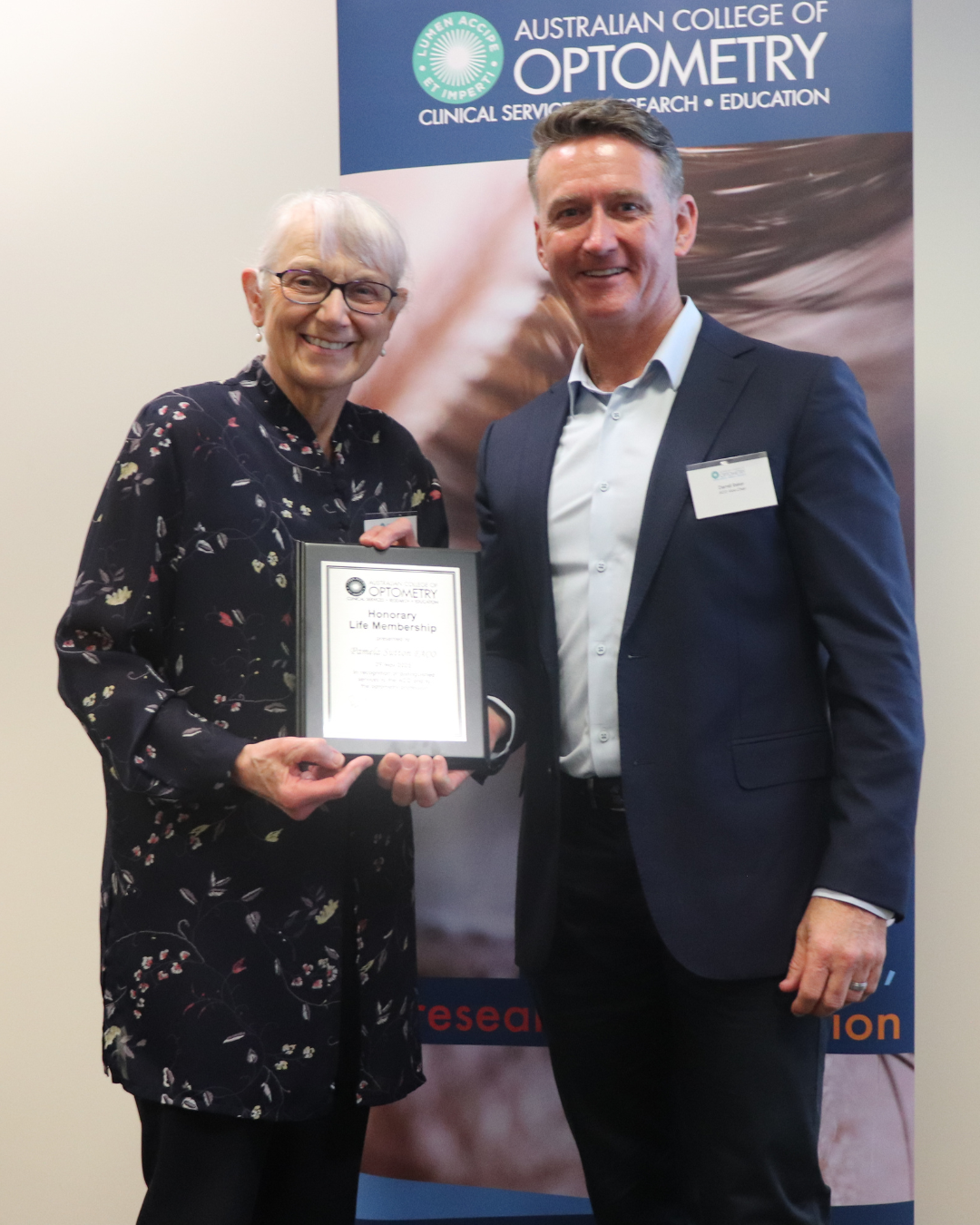 Pam Sutton receives Honorary Life Membership from Darrell Baker (Deputy Chair)