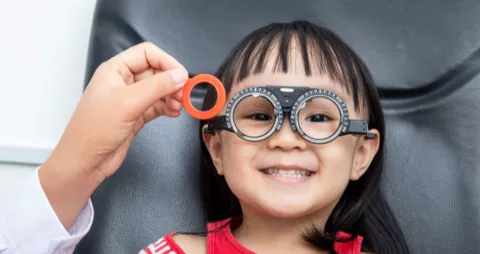 young asian girl trials prescription lenses